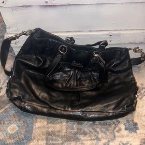 Black Coach bag with gorgeous purple interior